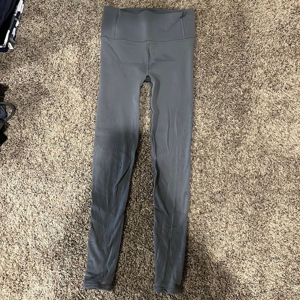 Size XS Lulu, grey leggings with a fun flower pattern from lower thigh to ankle.